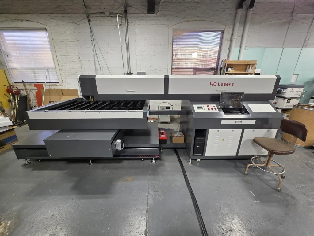600 watt industrial CO2 laser cutting system at Product Identification Company